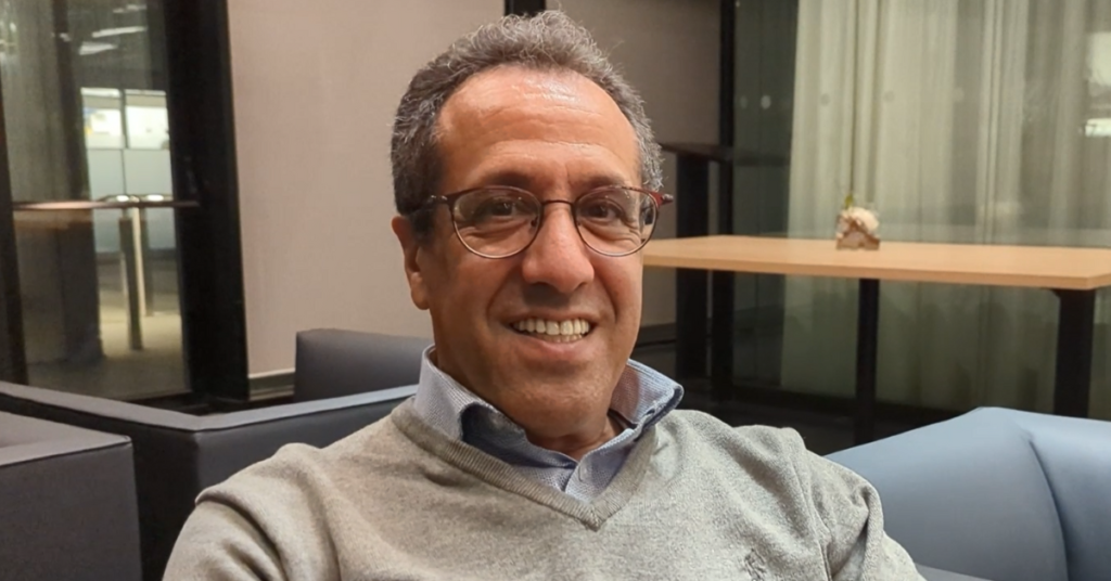 Dr Samir Mounir smiling at camera